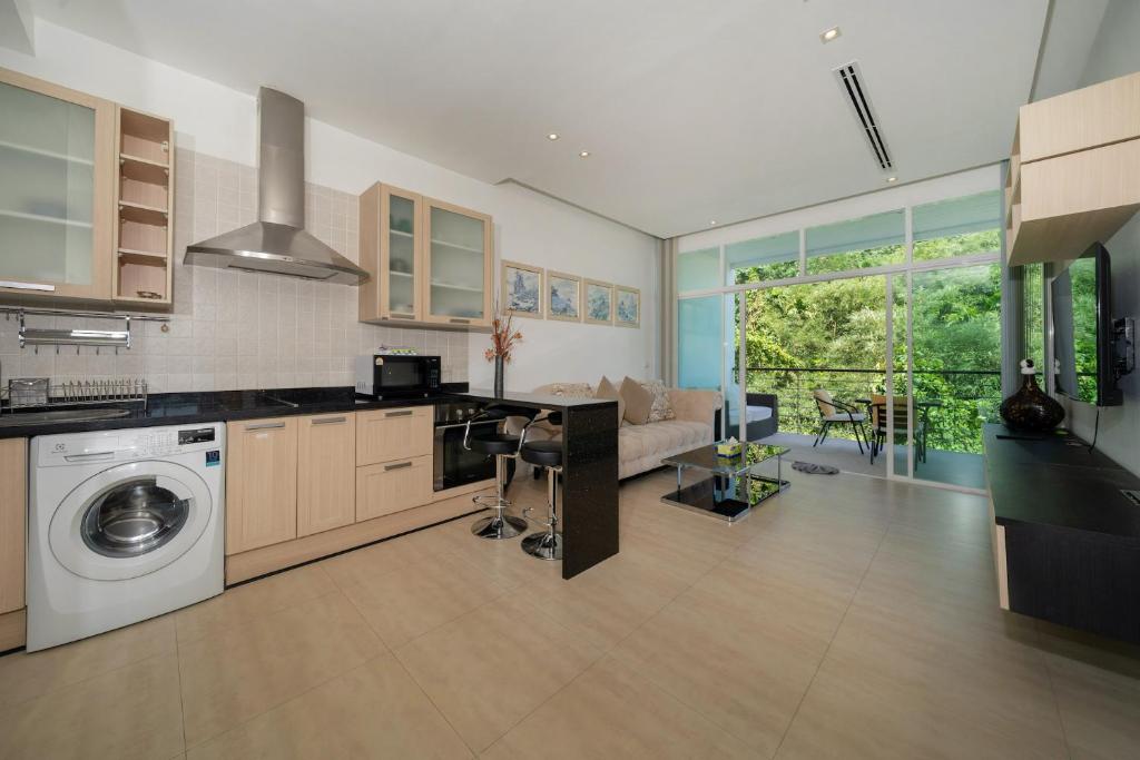 Grand Kamala Falls - 2 BR Apartment