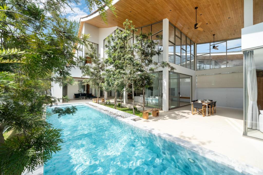 Modern Masterpiece with Tropical Flair! 5BR Villa Trinity C4 Modern Masterpiece with Tropical Flair! 5BR Villa Trinity C4